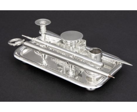 English bureauset with inkwell, small candlestick, pens, ... on a dish in marked silver sold with an Italian paperknife  || E