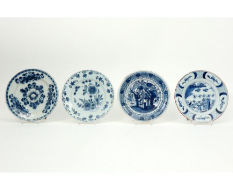 four 18th Cent. plates in ceramic from Delft with blue-white decors || Lot van vier achttiende eeuwse borden in Delftse faïen