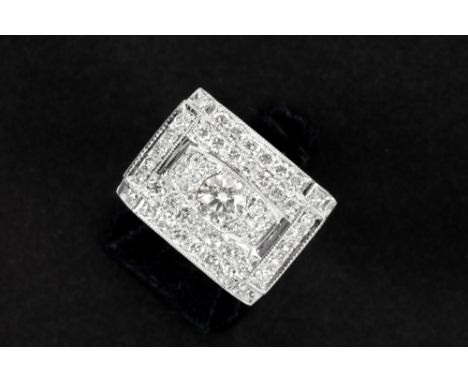 ring in late Art Deco style realized in grey gold (18 carat) with a typical decorative piece set with approx. 1.30 carat qual