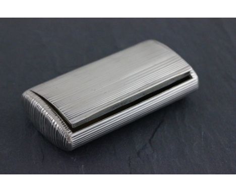 A George III hallmarked silver snuff box; of rectangular form with ribbed decoration; the hinged lid opening to reveal silver