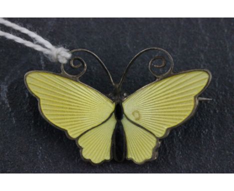 A David Andersen Norwegian sterling silver and yellow enamel brooch; in the form of a butterfly; bearing incised marks vero