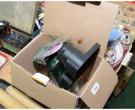 A chainsaw blade sharpener