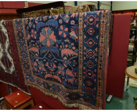 An antique Persian Malayer carpet. 1.7m x 1.22m
