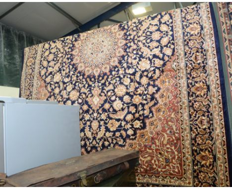 A Keshan style carpet with blue ground. 2.8m x 2.0m