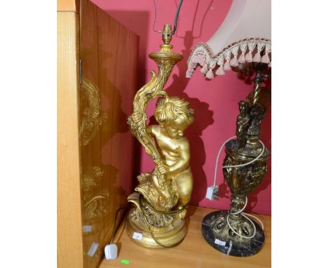 A gilt composition table lamp in the form of putto 