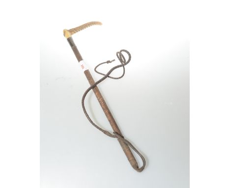 A silver mounted antler handled riding whip