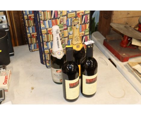 Four bottles of sparkling wine, red wine etc