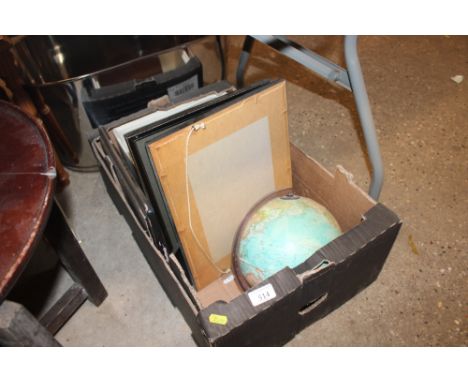 A box containing a world globe; prints etc