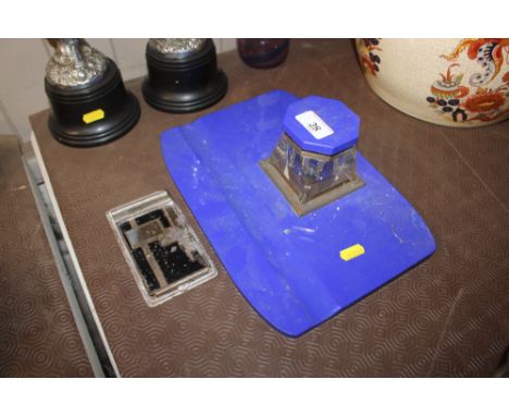 A blue glass desk stand with matching ink well together with an Art Deco clip AF
