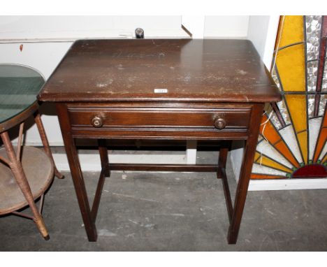 An Ercol side table fitted single drawer