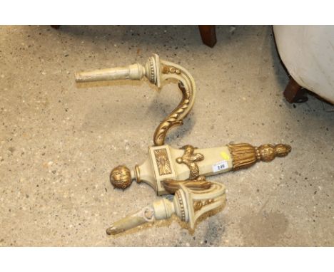 A gilt decorated twin branch wall light