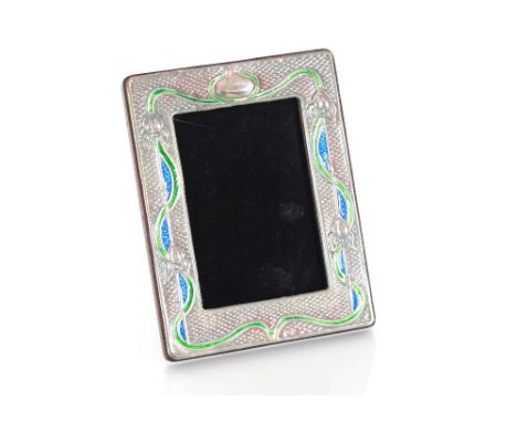 A sterling silver and enamel decorated Art Nouveau style photo frame 19cm x 14cm