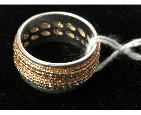 A ring bound with gilded wire by Links of London