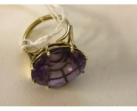 An 18ct laser cut large amethyst dress ring