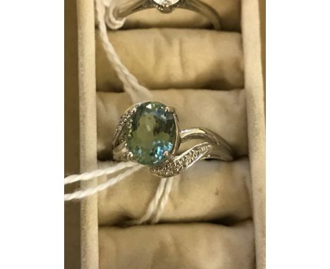 A Paraiba tourmaline and diamond dress ring