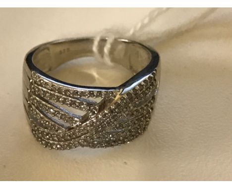 A 9ct diamond set filigree ring