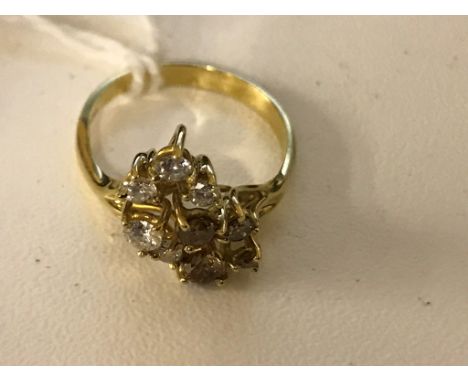 An 18ct abstract set diamond ring