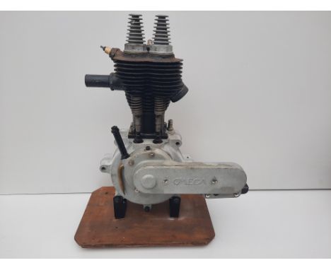An Omega enginenumbered IY/M 19040/M, believed restored although internal condition unknown, close inspection advised. Footno