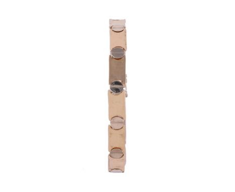 
	
		A GOLD COLOURED BRACELET
		The polished rectangular panels interspaced with circular links, stamped Italy 14k
		Size/dim