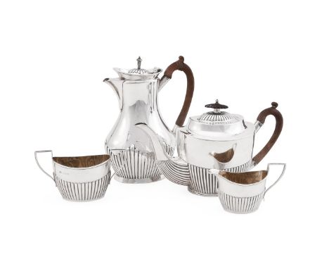 
	
		A MATCHED EDWARDIAN SILVER THREE PIECE OVAL HALF REEDED TEA SET
		TEA POT BY MAPPIN &amp; WEBB, SHEFFIELD 1900, CREAM JU