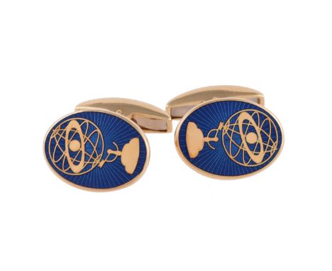 
	
		DEAKIN AND FRANCIS, A PAIR OF 18 CARAT GOLD ENAMELLED CUFFLINKS 
		BIRMINGHAM 2001
		The oval panels with globe upon a b