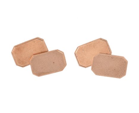
	
		A PAIR OF 9 CARAT GOLD CUFFLINKS 
		BIRMINGHAM 1965
		The octagonal panels with polished and engine turned decoration, b