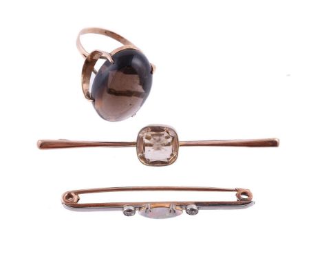 
	
		A SMALL COLLECTION OF JEWELLERY
		Comprising a smokey quartz dress ring, the oval cabochon smokey quartz with a facetted