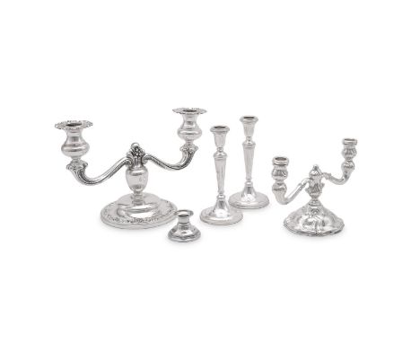 A GERMAN SILVER COLOURED TWIN BRANCH CANDELABRA POST 1886 .925 STANDARD With C-scroll shaped circular sconces, waisted capita