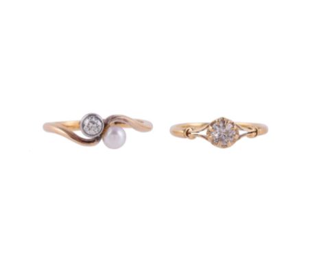 
	
		A DIAMOND AND PEARL CROSSOVER RING AND A DIAMOND SINGLE STONE RING
		The crossover ring with an old brilliant cut diamon