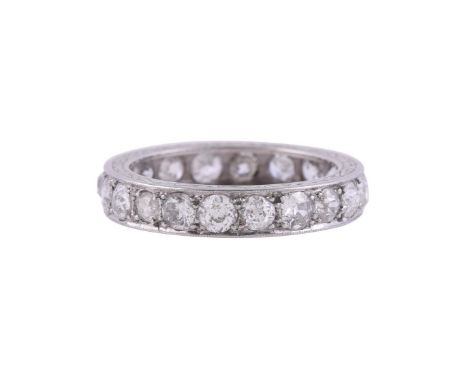 
	
		A DIAMOND ETERNITY RING
		The band set with old cut diamonds, approximately 2.00 carats total, with engraved sides
		Siz