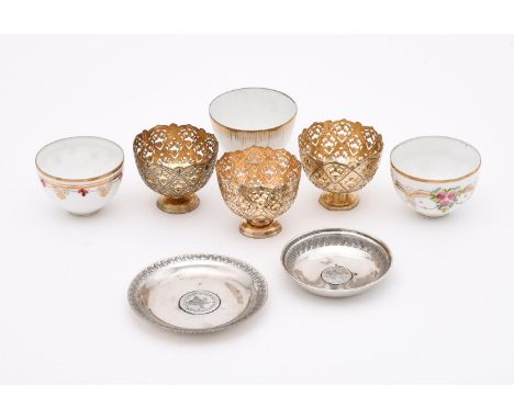 
	
		THREE TURKISH SILVER GILT COLOURED PIERCED PEDESTAL CUPS
		With shaped borders, pierced decoration and on circular mould