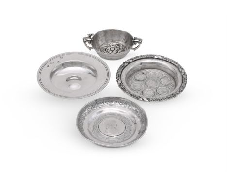 
	
		FOUR SILVER AND SILVER COLOURED DISHES
		Comprising: a silver armada dish by Garrard &amp; Co. Ltd., London 1969, with a