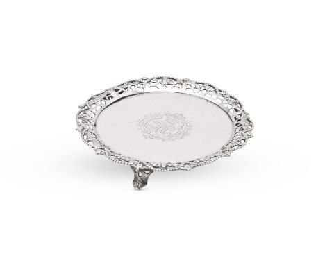 
	
		AN EARLY GEORGE III SILVER SHAPED CIRCULAR WAITER
		RICHARD RUGG, LONDON 1760
		With a chased and pierced beaded and flo