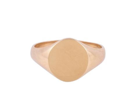 
	
		A POLISHED 18 CARAT GOLD SIGNET RING 
		BIRMINGHAM 1990
		The polished oval panel to a tapering shank
		Size/dimensions: