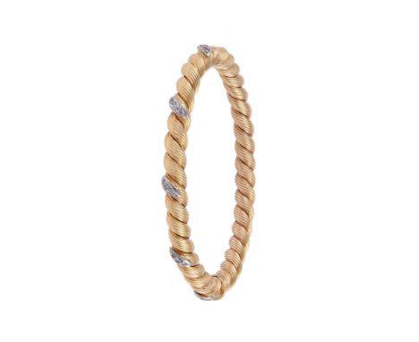 
	
		A DIAMOND HINGED BANGLE
		The rope twist bangle with graduated eight cut diamond accents, approximately 0.20 carats tota