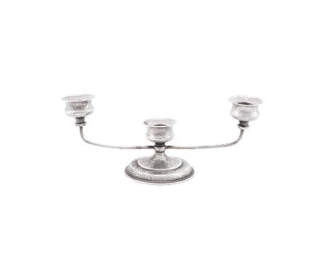 A COLOMBIAN SILVER COLOURED THREE LIGHT LOW CANDELABRA 
STAMPED T.R.P 0900, BOGOTA, 20TH CENTURY 
Circular and spot hammered 