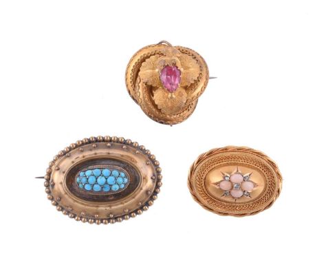 
	
		Y&nbsp;THREE VICTORIAN BROOCHES
		Comprising a Victorian coral and diamond oval brooch, circa 1860s, the quatrefoil of o