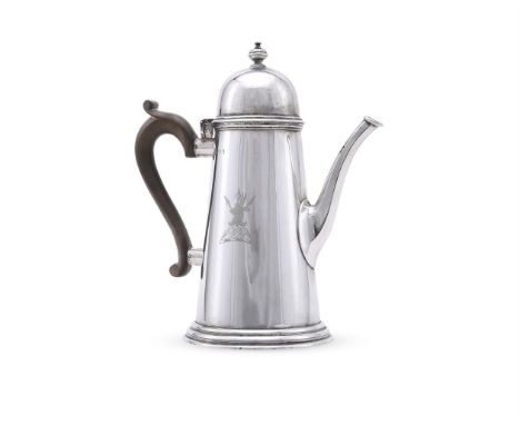 
	
		A SILVER TAPERING COFFEE POT
		CARRINGTON &amp; CO., LONDON 1967
		With an orb finial to the domed cover, a wood scroll 