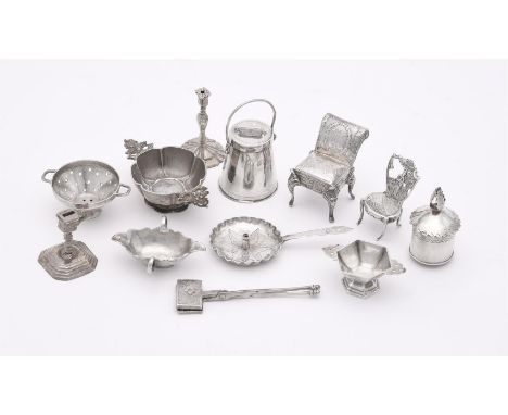 
	
		A COLLECTION OF DUTCH SILVER AND SILVER COLOURED MINIATURE ITEMS
		To include: a model of a chair, import mark for Londo