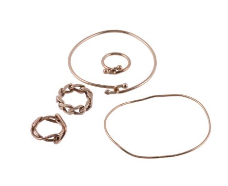 
	
		KURT WEISS FOR GUCCI, A 9 CARAT GOLD RING AND BANGLE 
		LONDON 1970
		The ring with a trio of interlocking figure eight 