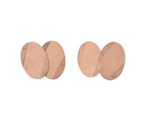 
	
		A PAIR OF 9 CARAT GOLD CUFFLINKS 
		BIRMINGHAM 1986
		The oval panels with scrolled foliate detail, with belcher link co