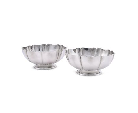 
	
		A PAIR OF AMERICAN SILVER COLOURED STANDISH BOWLS
		GORHAM, CIRCA 1930, NO. A12881
		With shaped circular border and on 