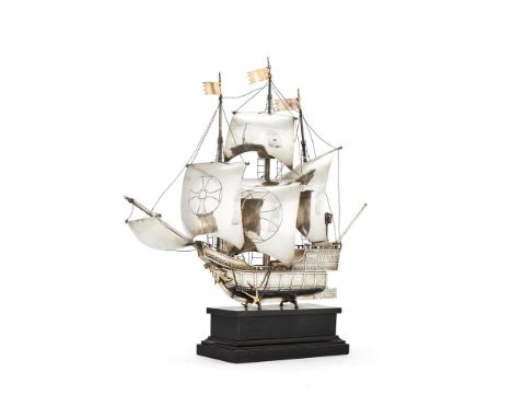 
	
		A GERMAN SILVER PARCEL GILT NEF, 
		STAMPED STERLING, 925 AND GERMANY, CIRCA 1930
		The three-masted ship with unfurled 