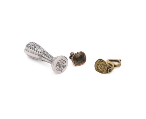 
	
		A FRENCH SILVER COLOURED SEAL
		MARK'S INDISTINCT
		The pommel chased with leaf and ribbon decoration, the circular matr