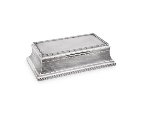 
	
		AN ART DECO SILVER CIGARETTE BOX
		GOLDSMITHS &amp; SILVERSMITHS CO. LTD., LONDON 1921
		With a reed border and engine t
