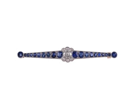 
	
		A SAPPHIRE AND DIAMOND BAR BROOCH
		The central old cut diamond flower head, approximately 0.20 carats total, to tapered