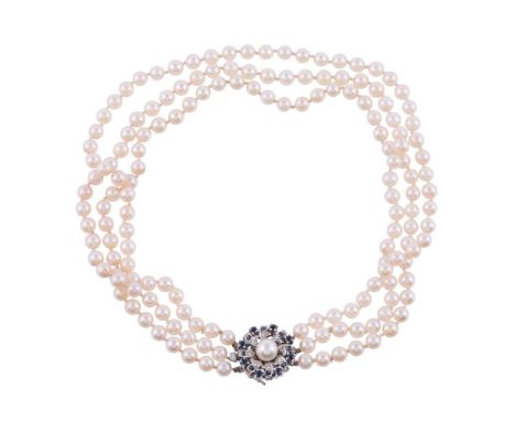 
	
		A SAPPHIRE, DIAMOND AND CULTURED PEARL NECKLACE
		The pierced 18 carat white gold cluster clasp set with circular cut sa