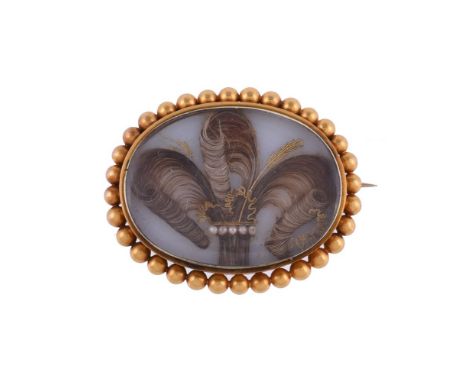 
	
		A MID GEORGE III HAIRWORK BROOCH 
		CIRCA 1800 
		The white paste panel with three applied coils of hair in the form of 