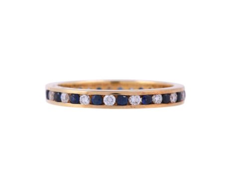 
	
		AN 18 CARAT GOLD SAPPHIRE AND DIAMOND ETERNITY RING 
		LONDON 2014
		The alternating circular cut sapphires and brillian