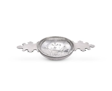 
	
		A GEORGE II SILVER LEMON STRAINER
		MAKER'S MARK OBSCURED, LONDON 1730
		With twin scrolling handles, a pierced bowl and